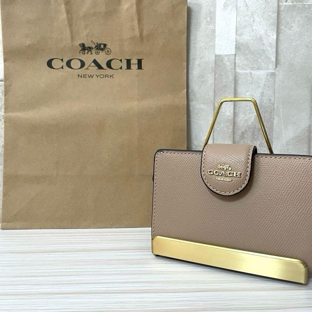早い者勝ち！訳あり新品 COACH 二つ折り財布 ベージュ系