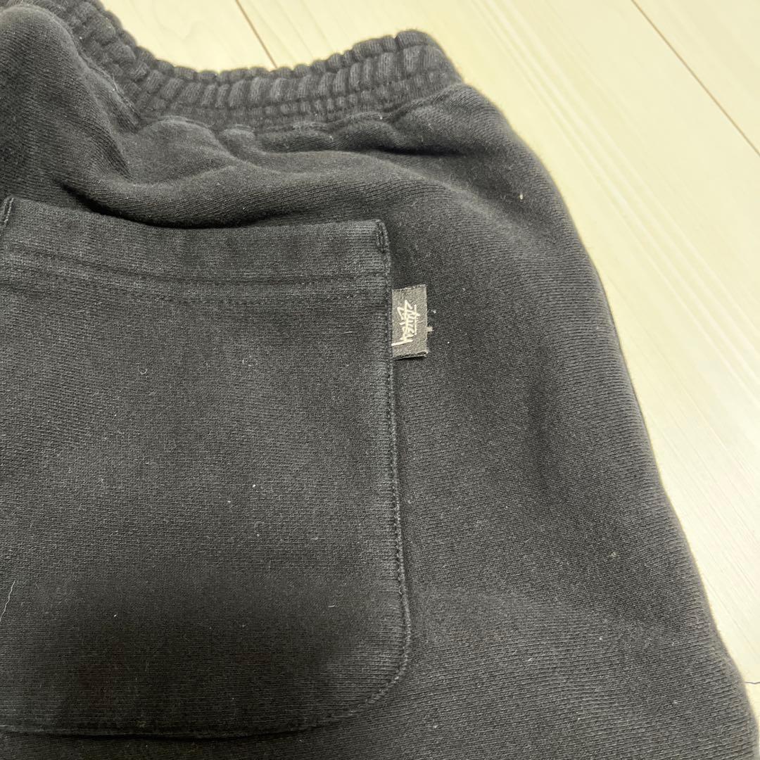 Stussy ブラック スウェットパンツ