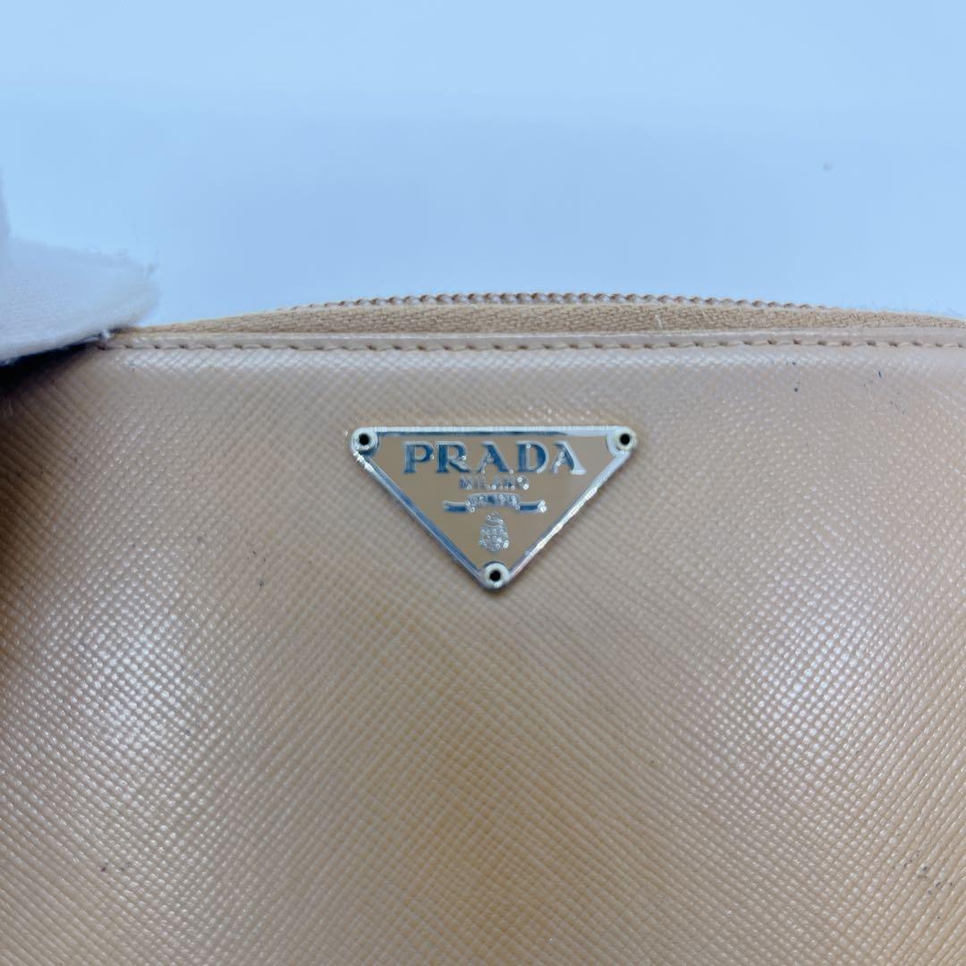 【人気モデル】PRADA 二つ折り財布 ベージュ 三角ロゴ 1ML522