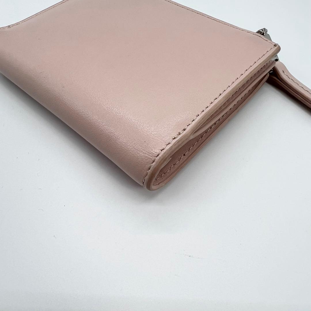 美品✨ディーゼル　ミニウォレット　二つ折り財布　Dロゴ　メタルロゴ　ピンク