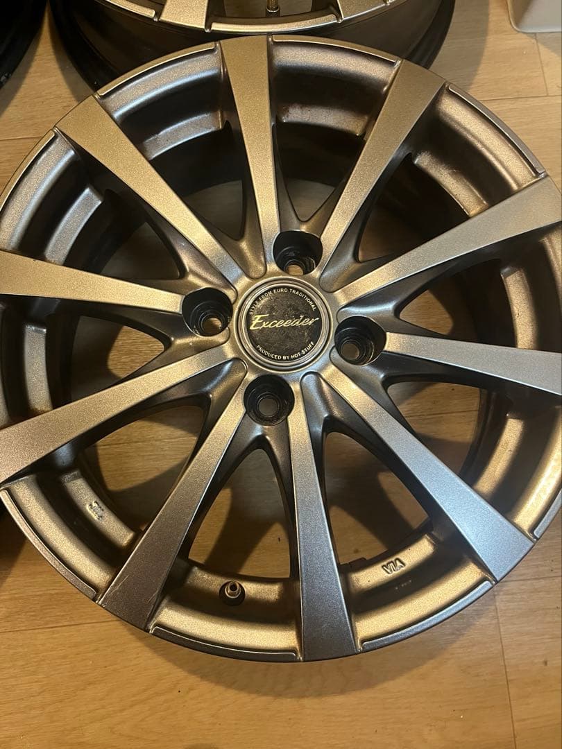送料込！ホットスタッフ5.5J4H100の15インチ アルミホイールガンメタ4枚