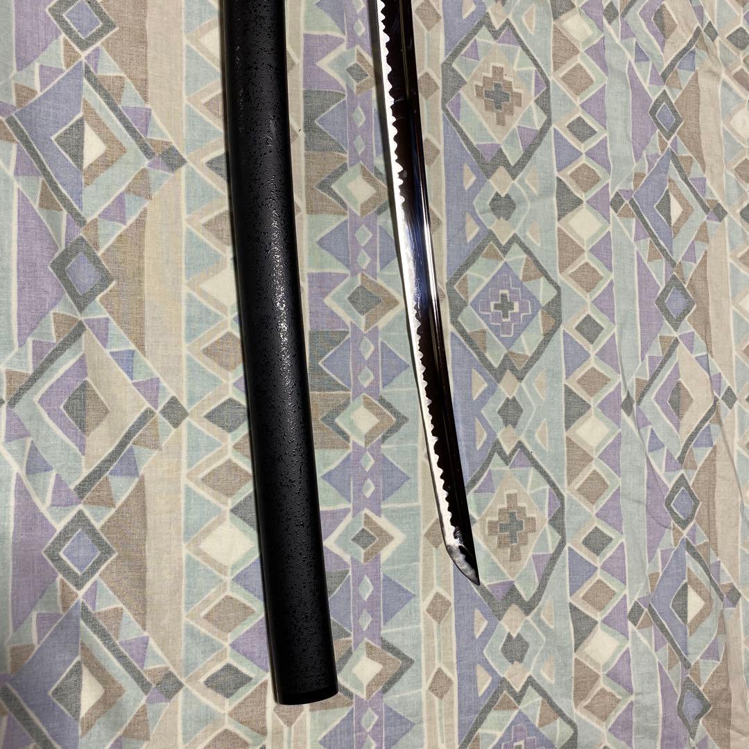 上級居合刀 黒柄 龍彫透し金縁丸鍔 黒梨地鞘