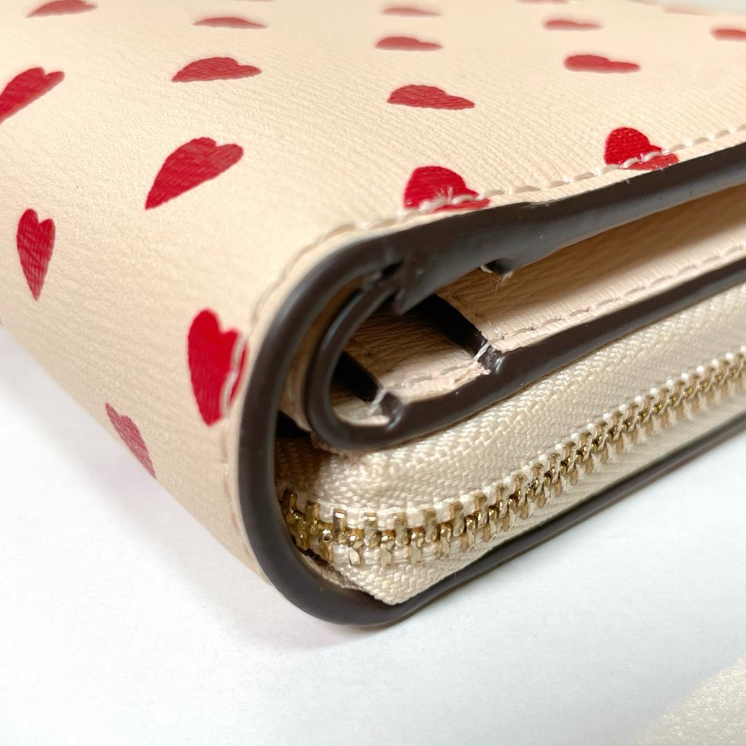 キュートなハート柄❤️kate spade スペンサー　二つ折り財布　ハート