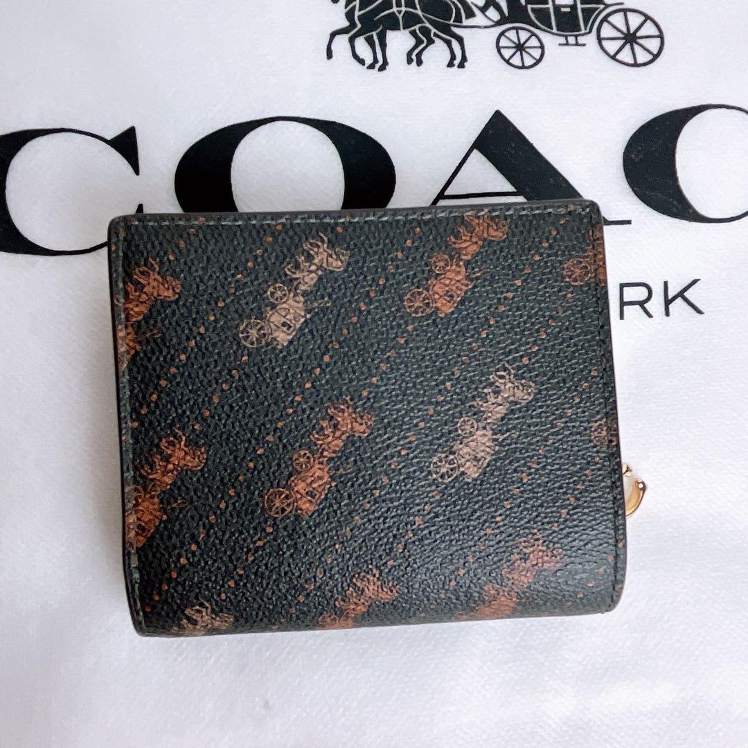 新品未使用 COACHコーチ 財布 コンパクト 二つ折り 馬車 チャーム レザー