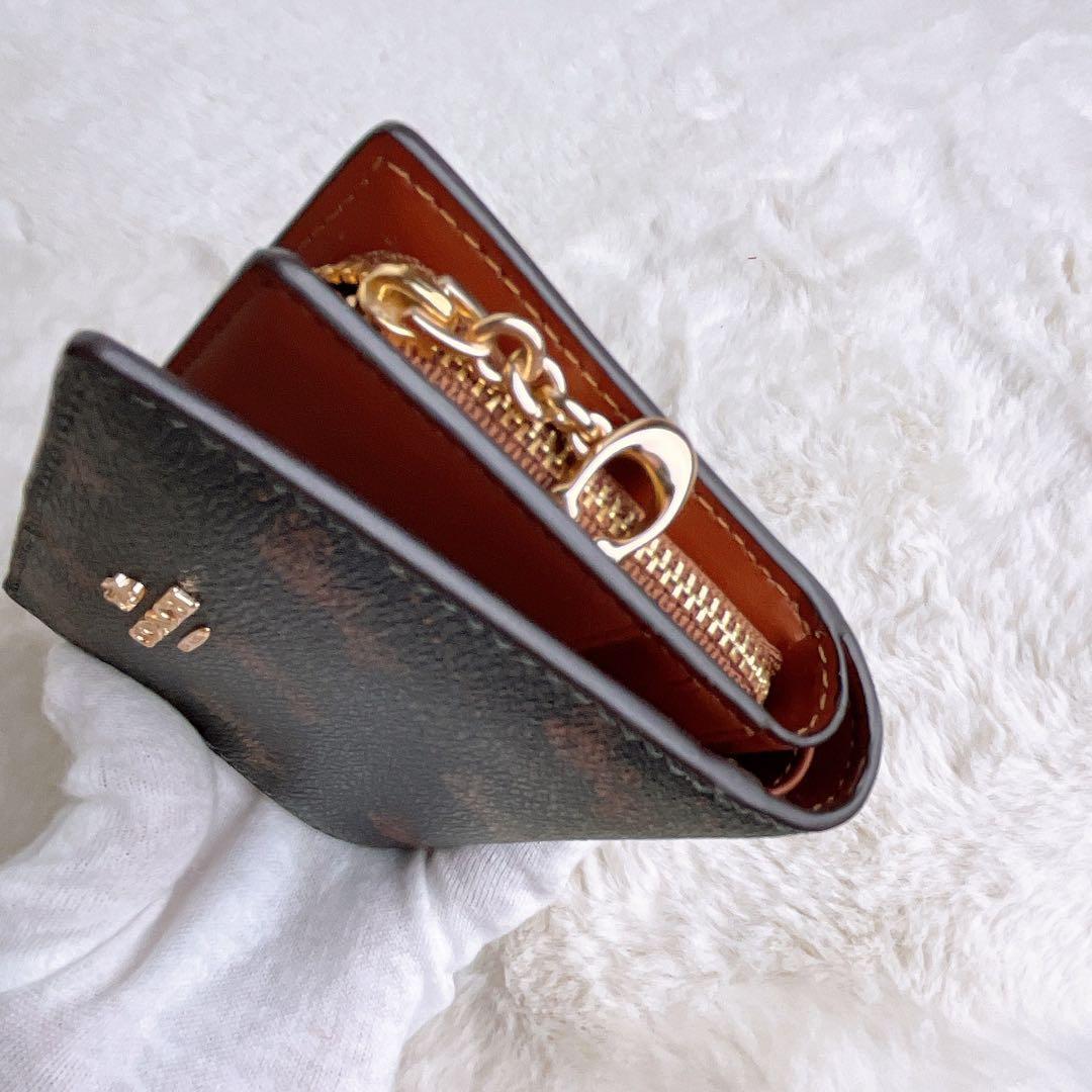 新品未使用 COACHコーチ 財布 コンパクト 二つ折り 馬車 チャーム レザー
