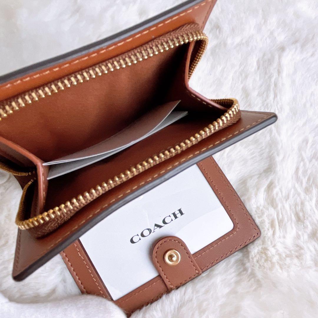 新品未使用 COACHコーチ 財布 コンパクト 二つ折り 馬車 チャーム レザー