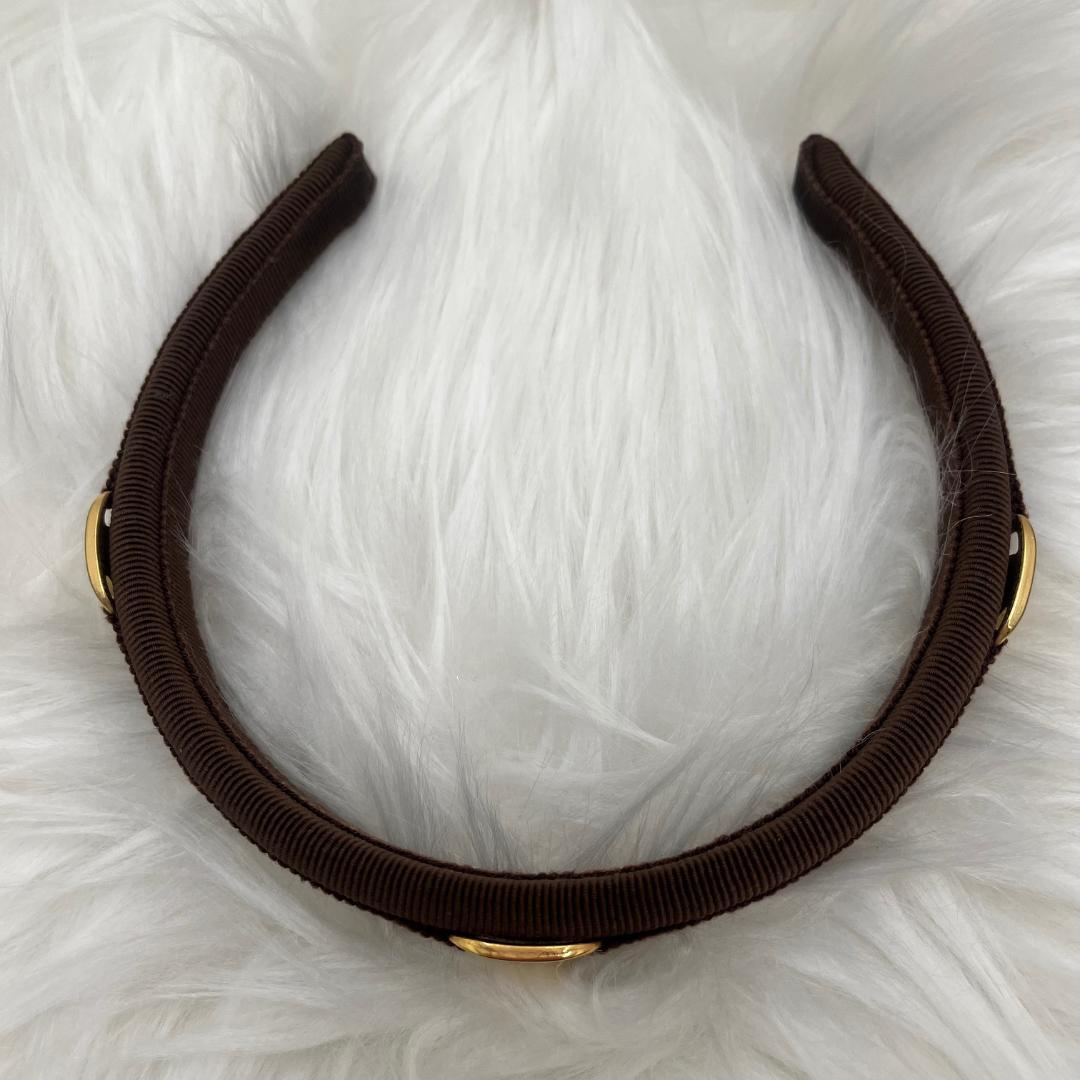 希少品美品✨Ferragamo フェラガモ カチューシャ　ブラウン　ロゴプレート