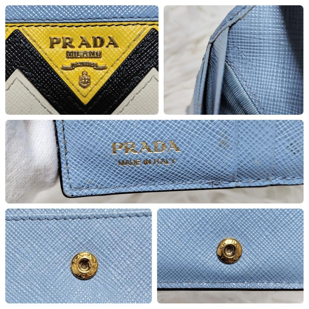 レア美品✨プラダ◇コンパクト二つ折り財布　ギザギザ模様水色イエローゴールド金具