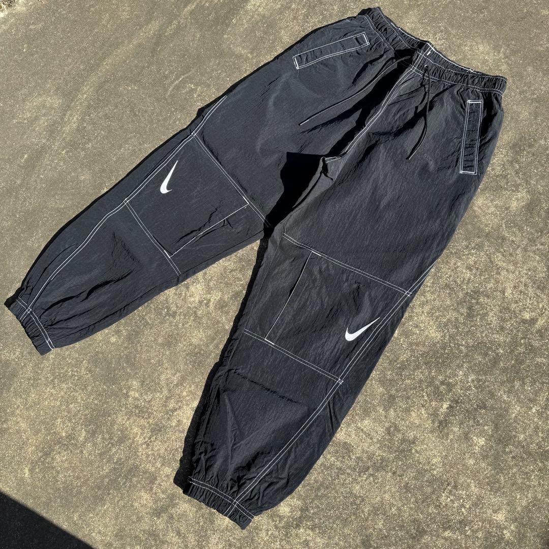 たっくーや　NIKE ナイキ スウッシュステッチ トラックパンツ 黒 M