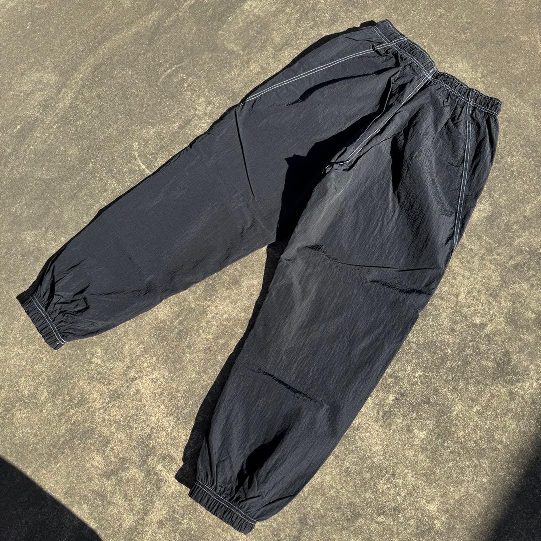 たっくーや　NIKE ナイキ スウッシュステッチ トラックパンツ 黒 M