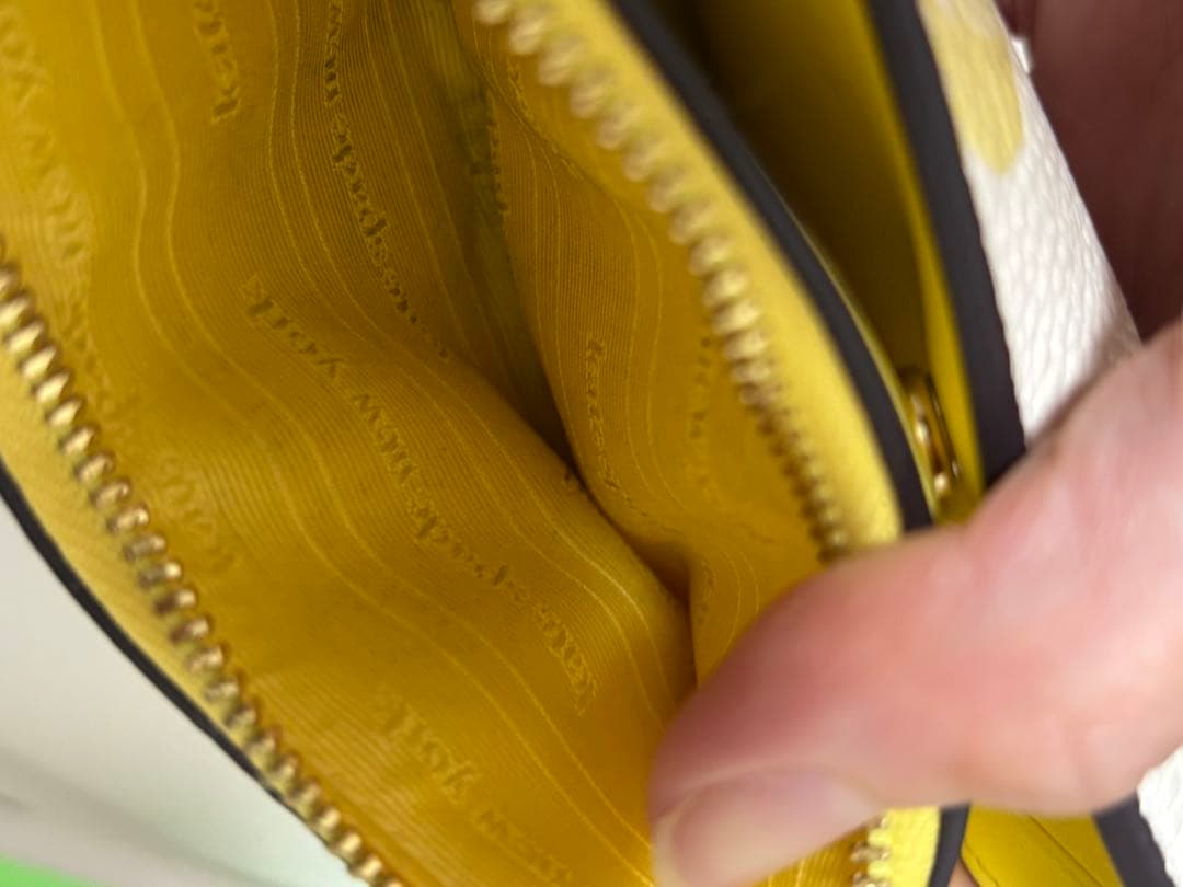 ケイト・スペード 花柄 二つ折り財布 今年のラッキーカラーの黄色です！