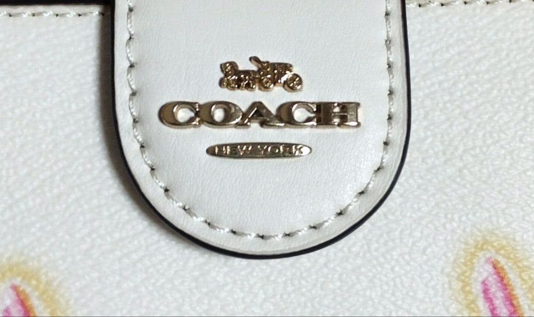 d*a様 【新品】COACH リップスティック柄 二つ折り財布