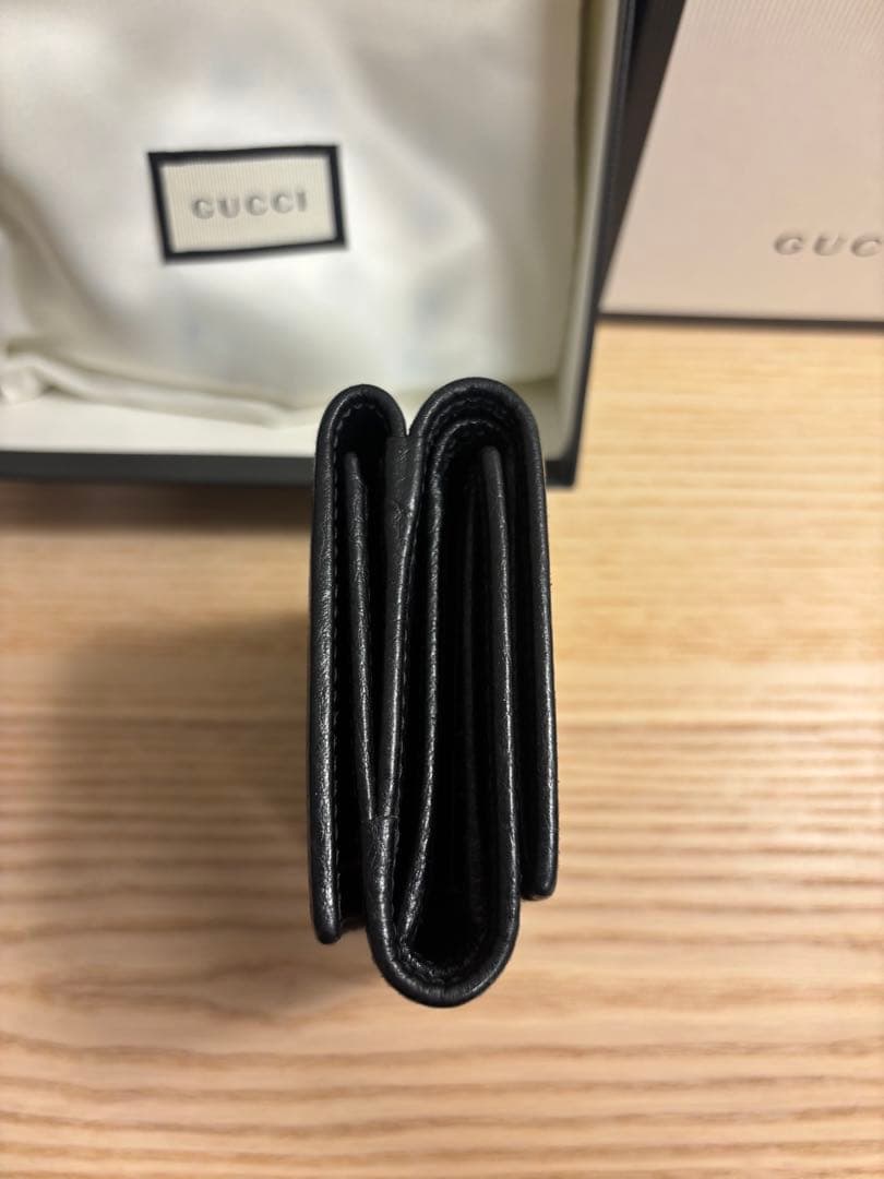 【箱保存袋付き】GUCCI GGマーモント 三つ折り財布 ブラックレザーゴールド
