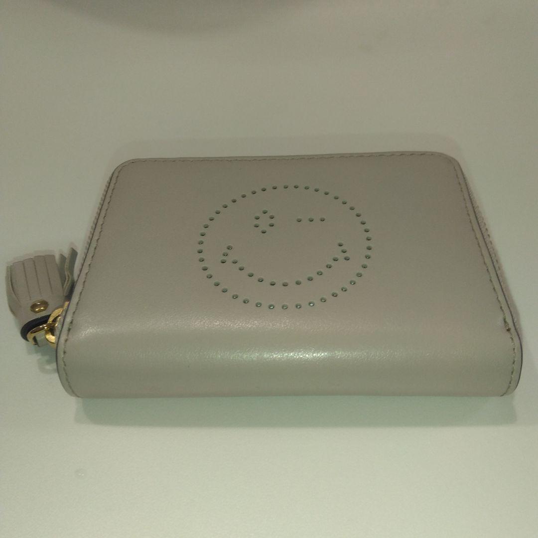 【未使用品級】アニヤハインドマーチ　ミニ財布　オレンジ　本革　スマイリーウィンク