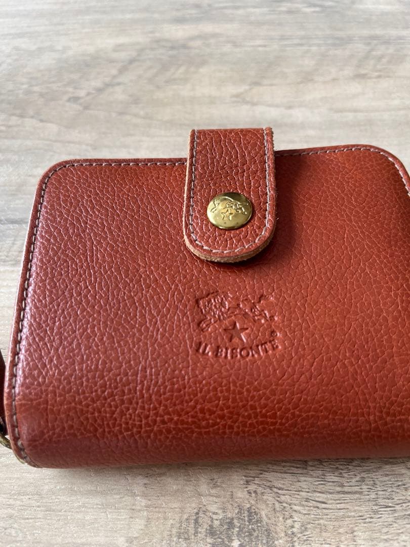 IL BISONTE ブラウン 二つ折り財布 収納袋付き