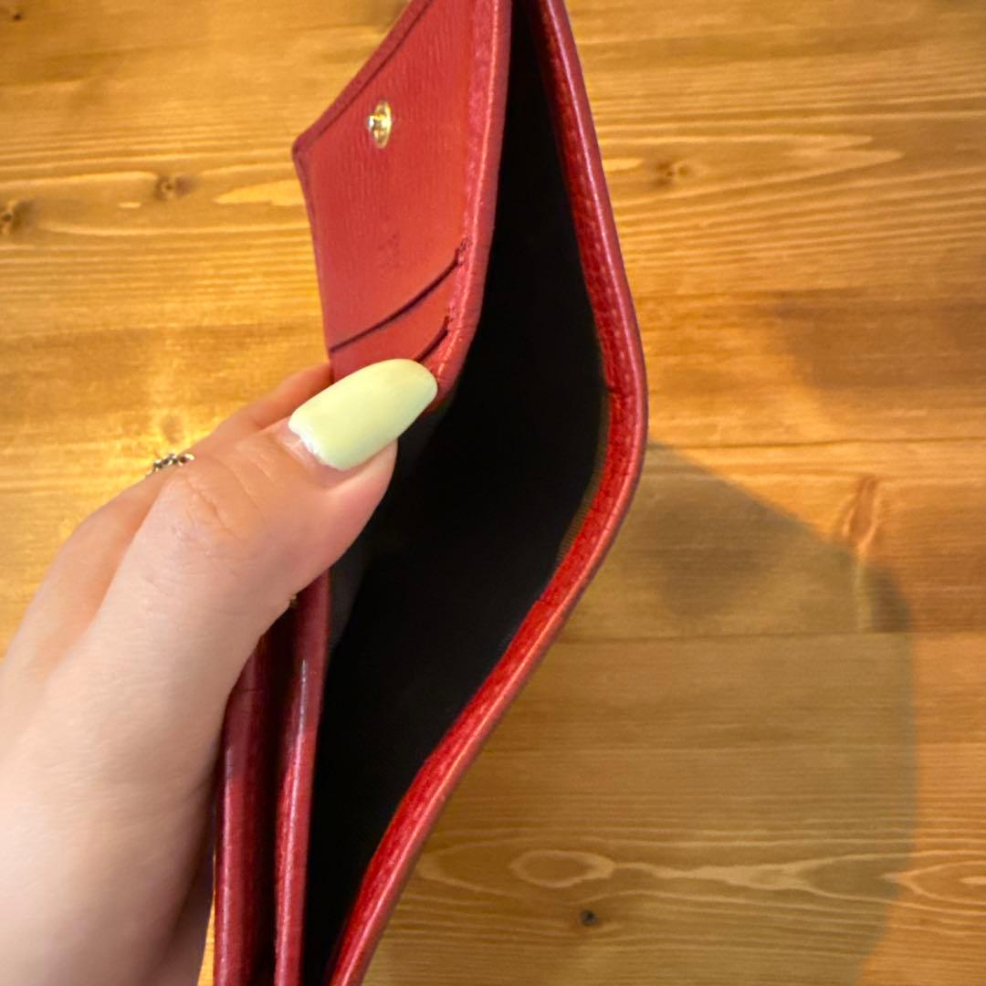 GUCCI(グッチ) 二つ折り財布　GGマーモントロゴ金具　レザー赤