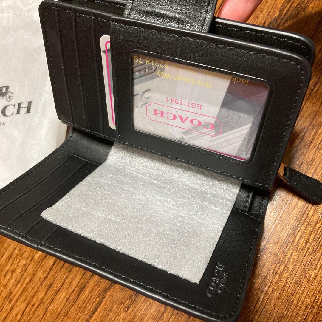 COACH ブラック 二つ折り財布 保存袋付き　ほぼ未使用品