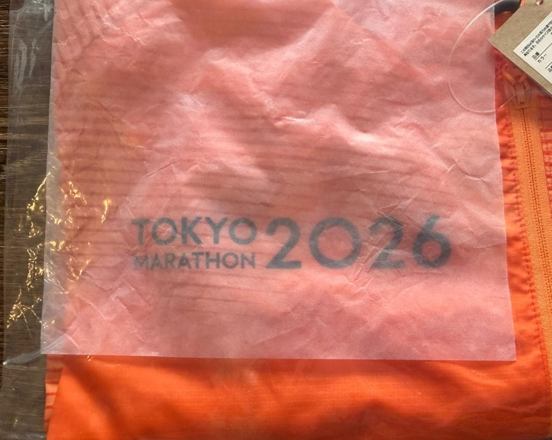 ASICS 東京マラソン2026 RUN TOKYOウィンドブレーカーオレンジL