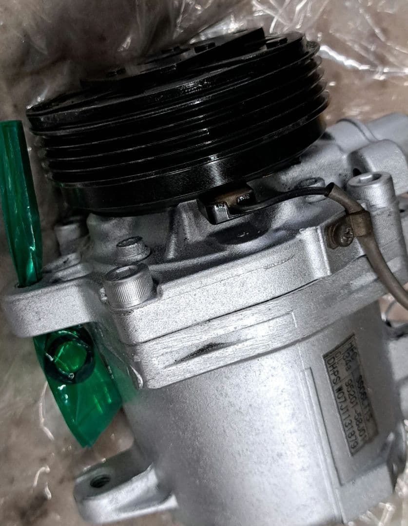 スズキ　エアコンコンプレッサ　ワゴンR MH21 など 58J01