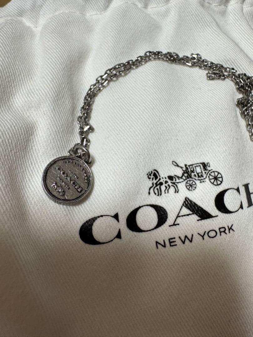 COACH シルバー型ネックレス　恐竜