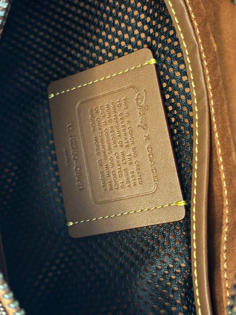 未使用　COACH ディズニー ボディバッグ シグネチャー WDW 50周年