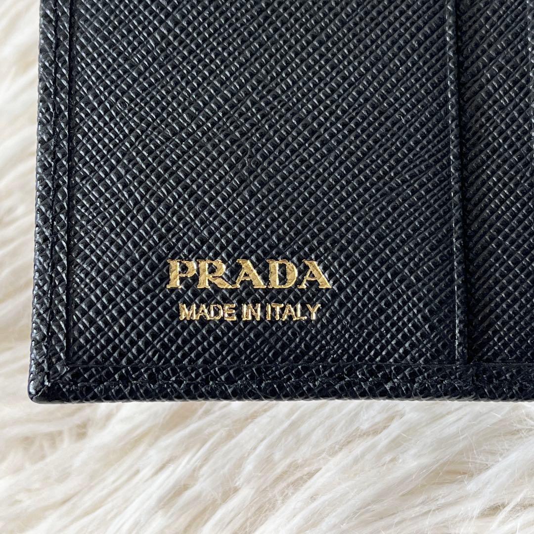 新品✨PRADA プラダ　サフィアーノ　二つ折り財布　三角ロゴ　1mv204 黒