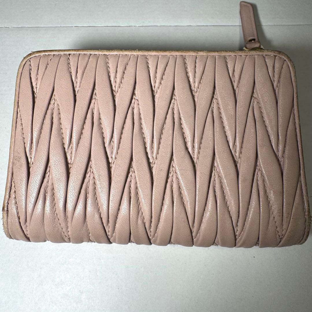 ミュウミュウ 折り財布 マテラッセ ロゴ金具 ビジュー クリスタル ピンク