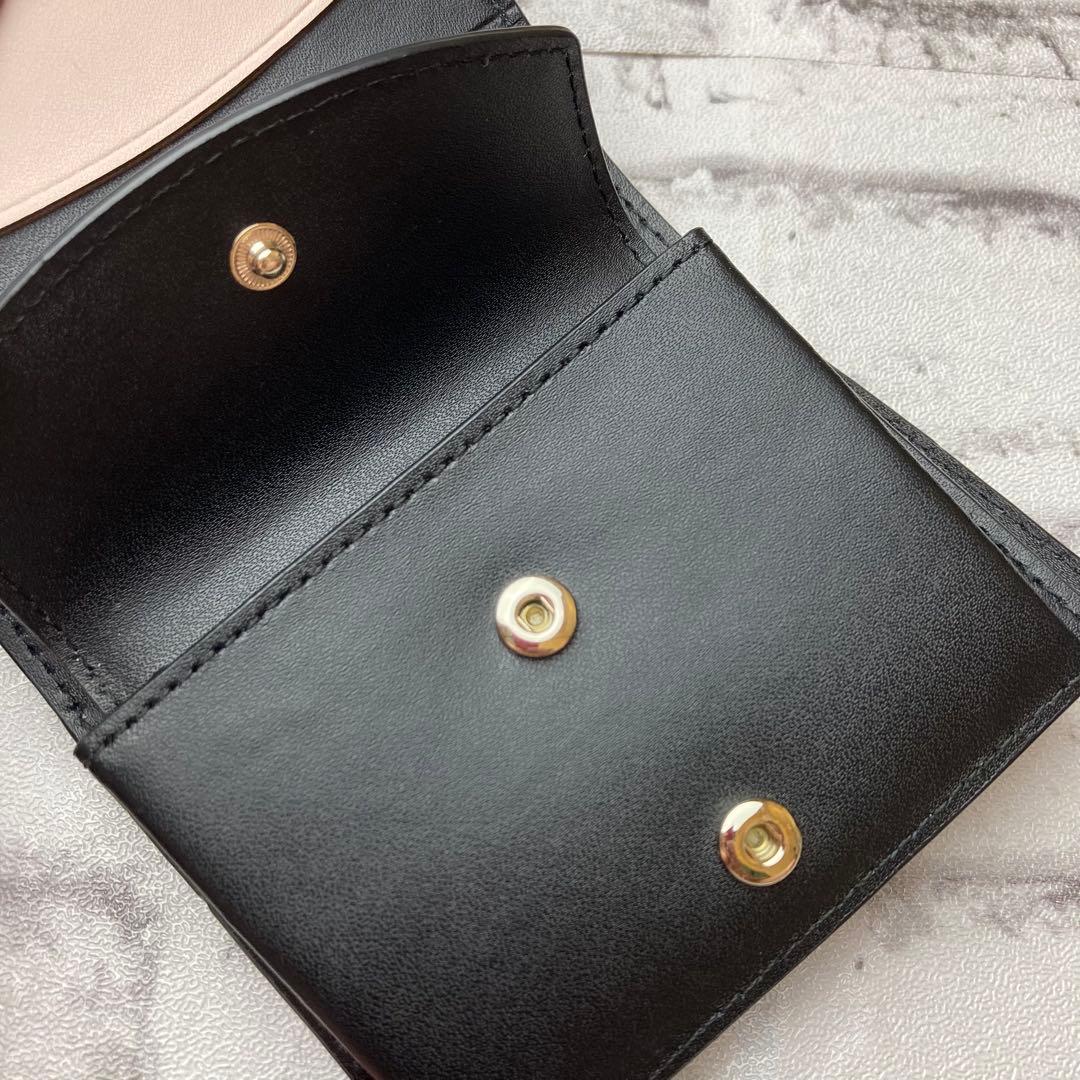 【美品】ケイトスペードニューヨーク★二つ折り財布　ブラック　ツイストロック