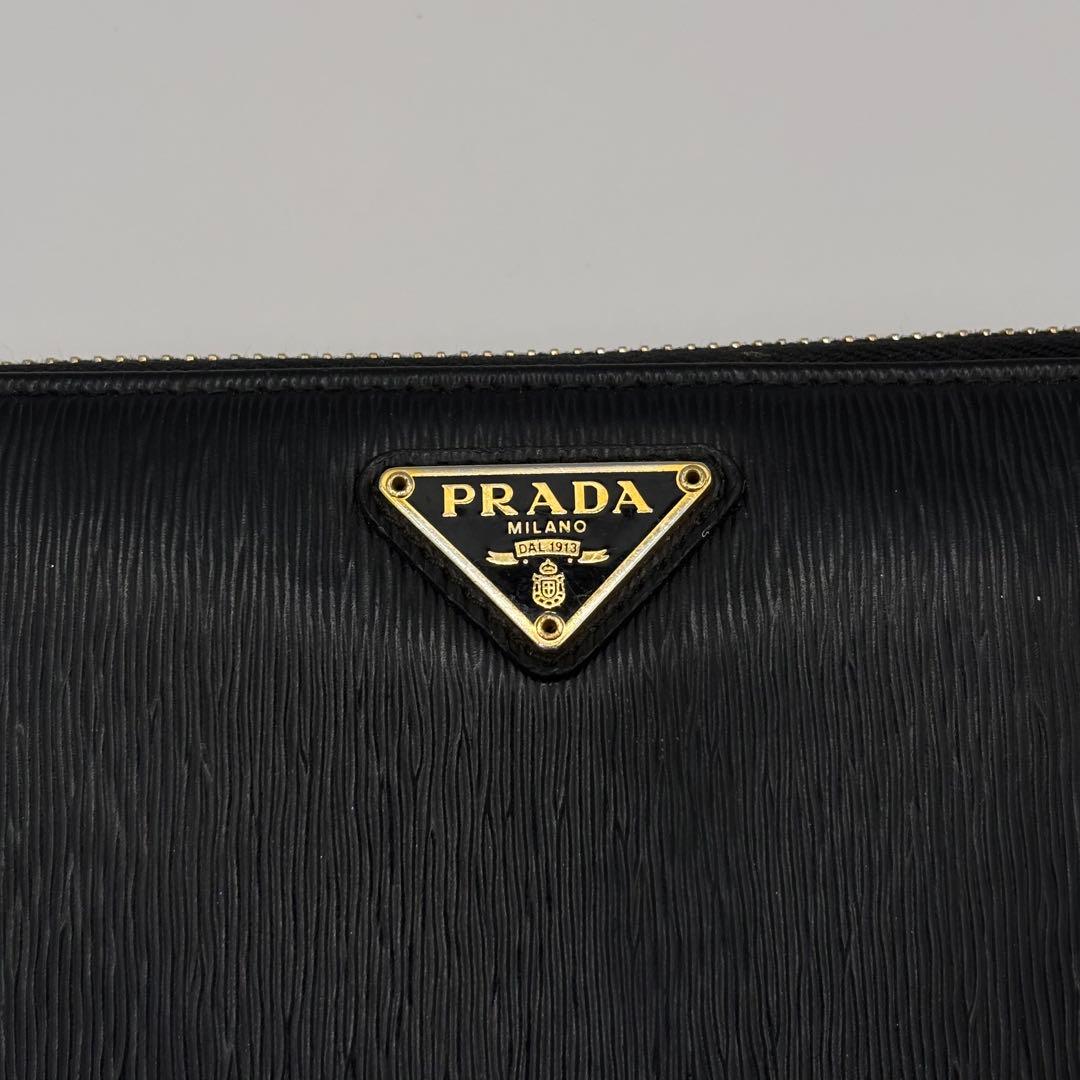PRADA ラウンドジップ　ミディアムウォレット　1ML157 ヴィッテロムーブ