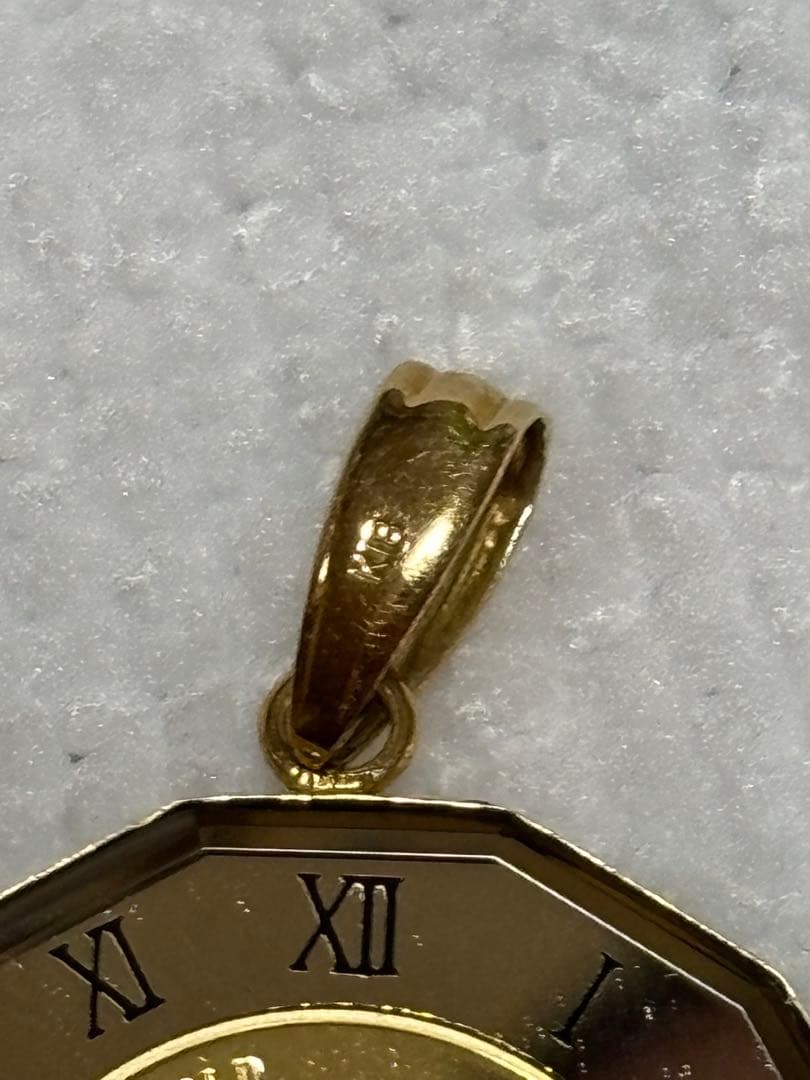 24kクラウンペンダント1/25オンス ローマ数字はガラスです
