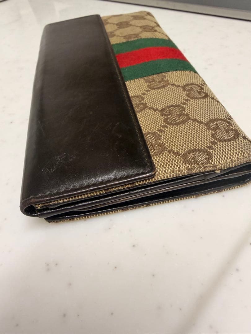 l*y様 Gucci GGキャンバス 二つ折り財布