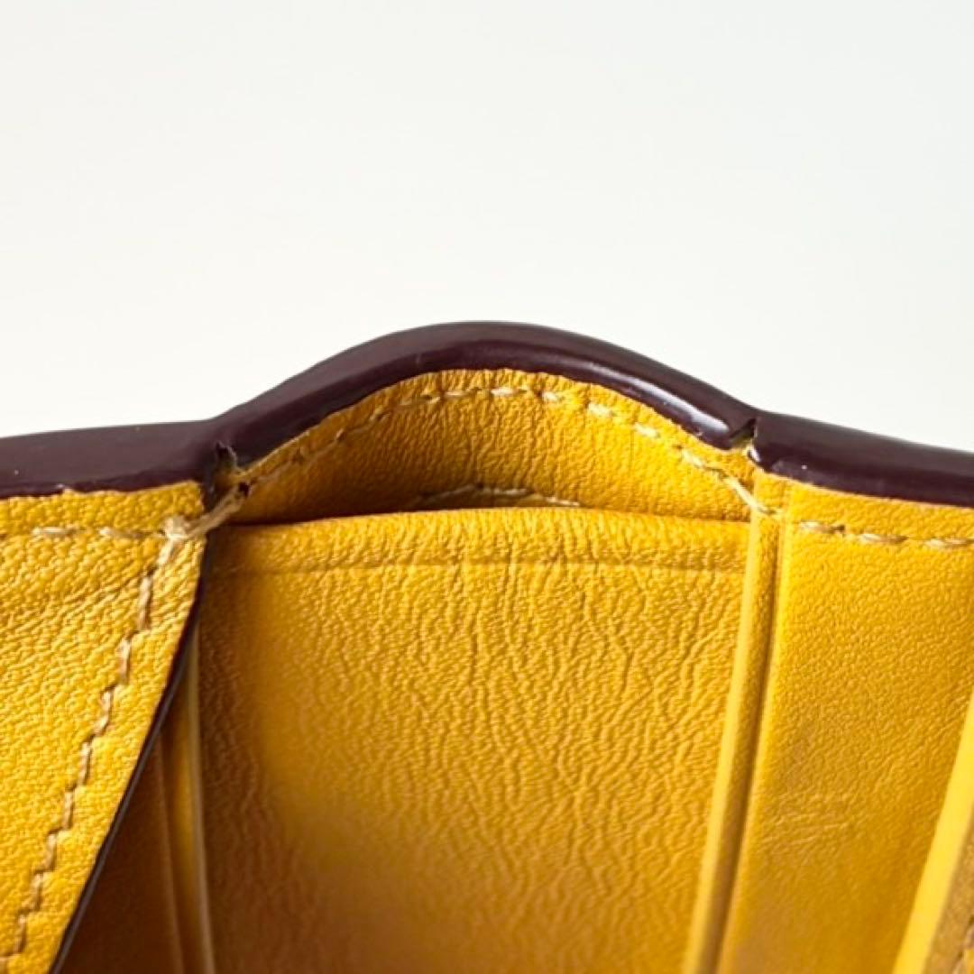 【極美品】COACH 二つ折り財布 ノマド グラブタンレザー 本革 マスタード