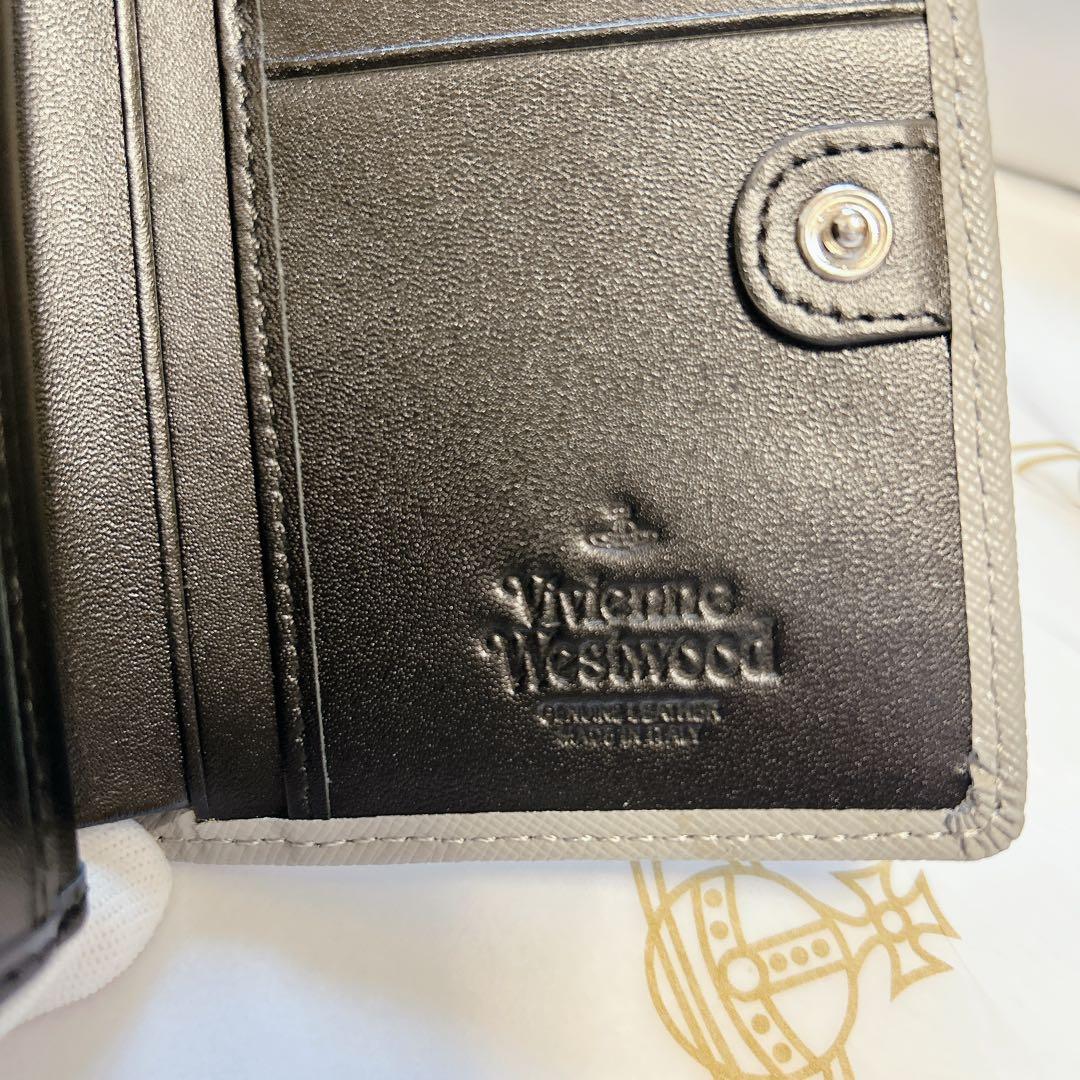 ヴィヴィアンウエストウッド　グレーがま口二つ折り財布