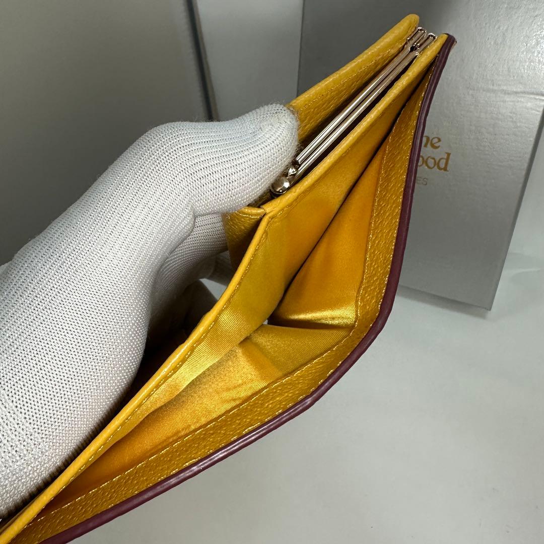 【人気！新品】Vivienne Westwood 二つ折り財布　　イエロー