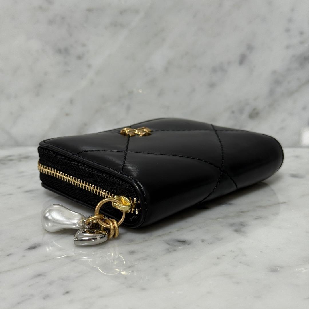 Tory Burch トリーバーチ 二つ折り財布 ジップ キルティング 黒