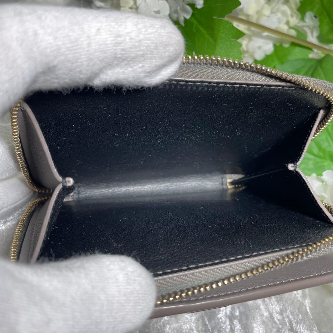 サンローラン 二つ折り財布 ラウンドジップ カサンドラ グレー YSL