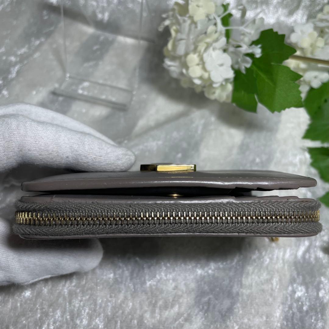 サンローラン 二つ折り財布 ラウンドジップ カサンドラ グレー YSL