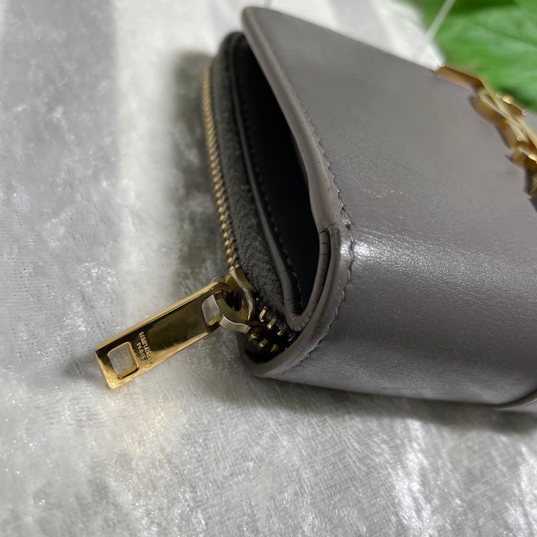 サンローラン 二つ折り財布 ラウンドジップ カサンドラ グレー YSL
