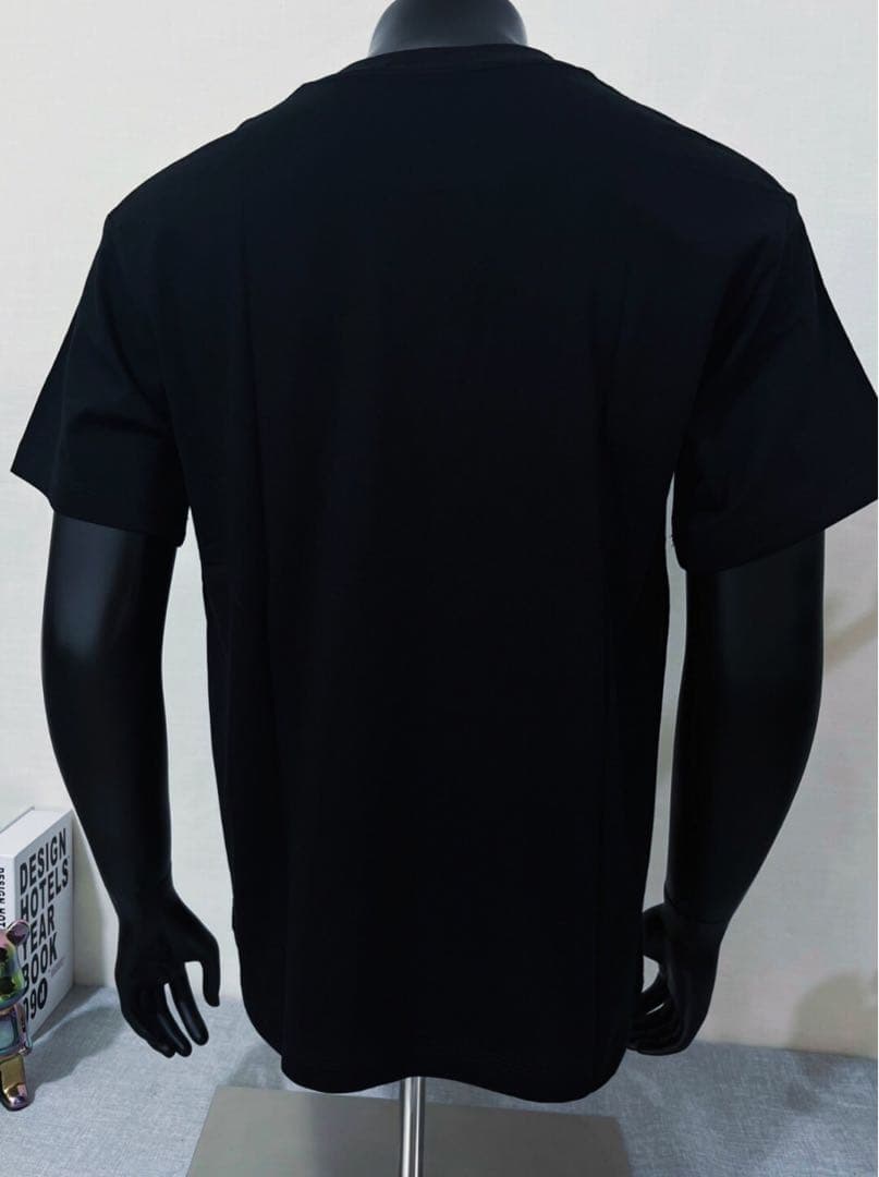 Acne Studios ブラック Tシャツ STOCKHOLM 1996
