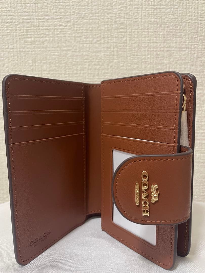 コーチ　レディース　折財布　ブラウン　小銭入れあり　新品　未使用