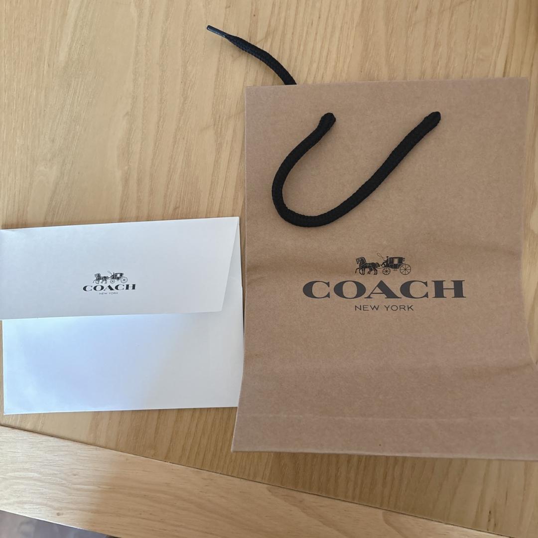 M*o様 COACH コ－チ 二つ折り財布 シグネチャー 【新品・未使用】