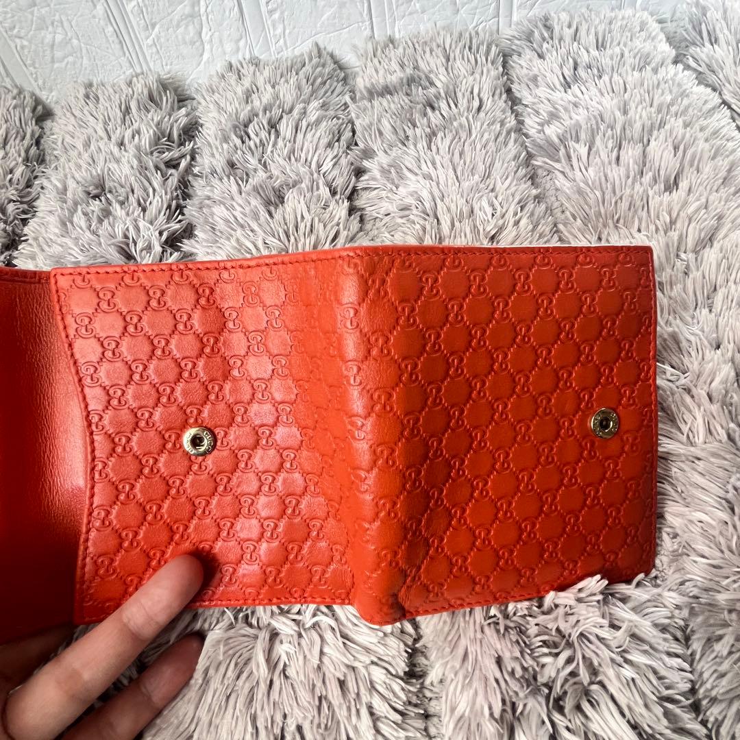 美品✨GUCCI マイクロシマ　折り財布　オレンジ　ロゴプレート　Wホック
