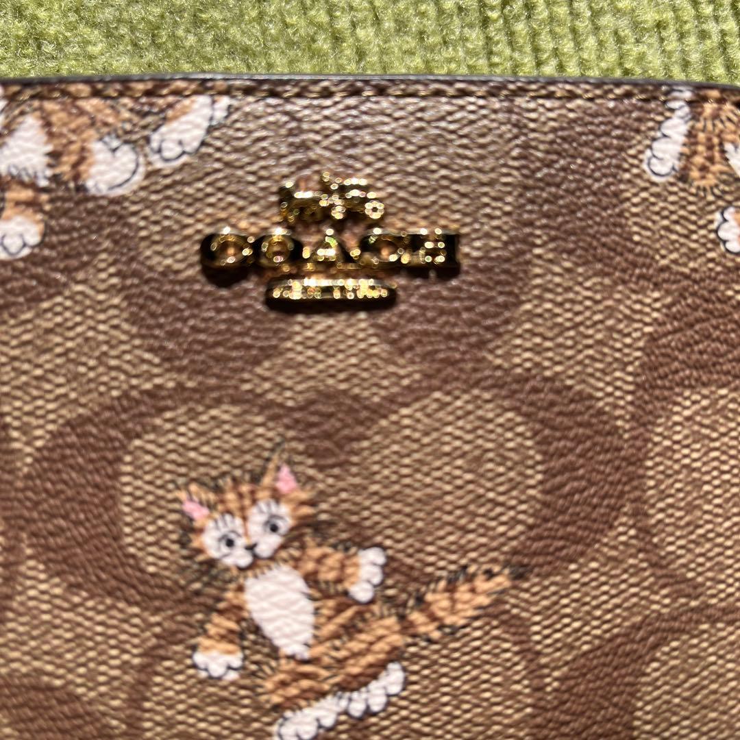 COACH 猫プリント 二つ折り財布