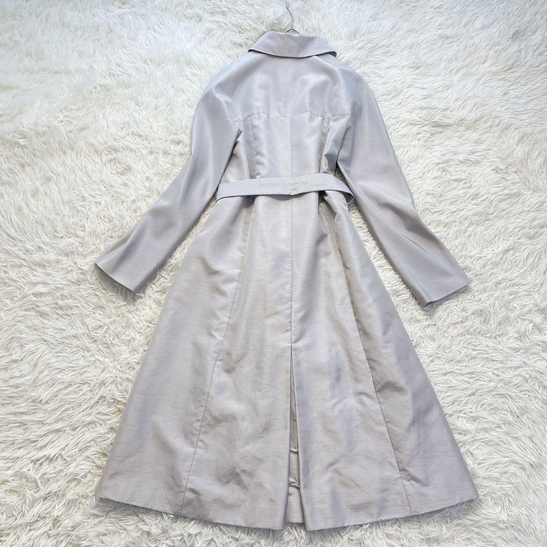 シビラ ベルト付き スプリングコート フレア 光沢シルバー ロング丈