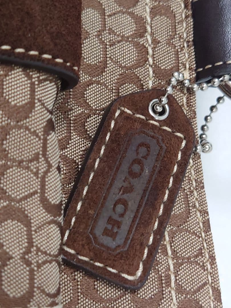 COACHコーチボストンバッグ　こげ茶色シグネチャー