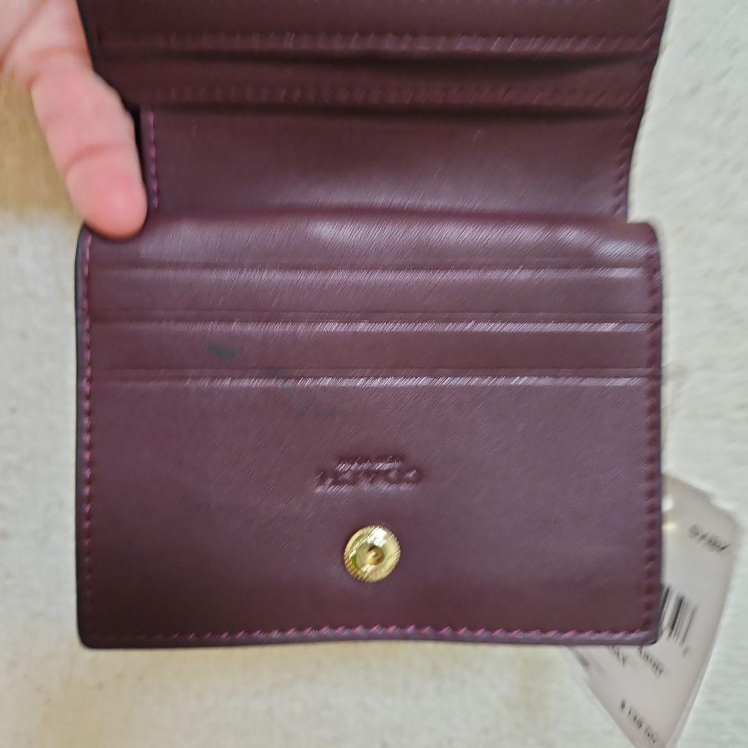 タグ付き COACH花柄2つ折りミニ財布