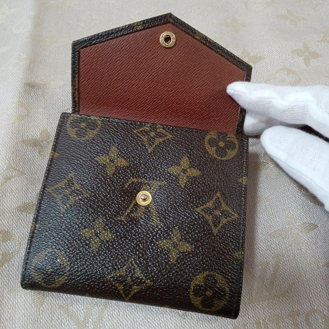 ルイ・ヴィトン。訳あり美品、モノグラム Wホック小銭入れ付き折り財布