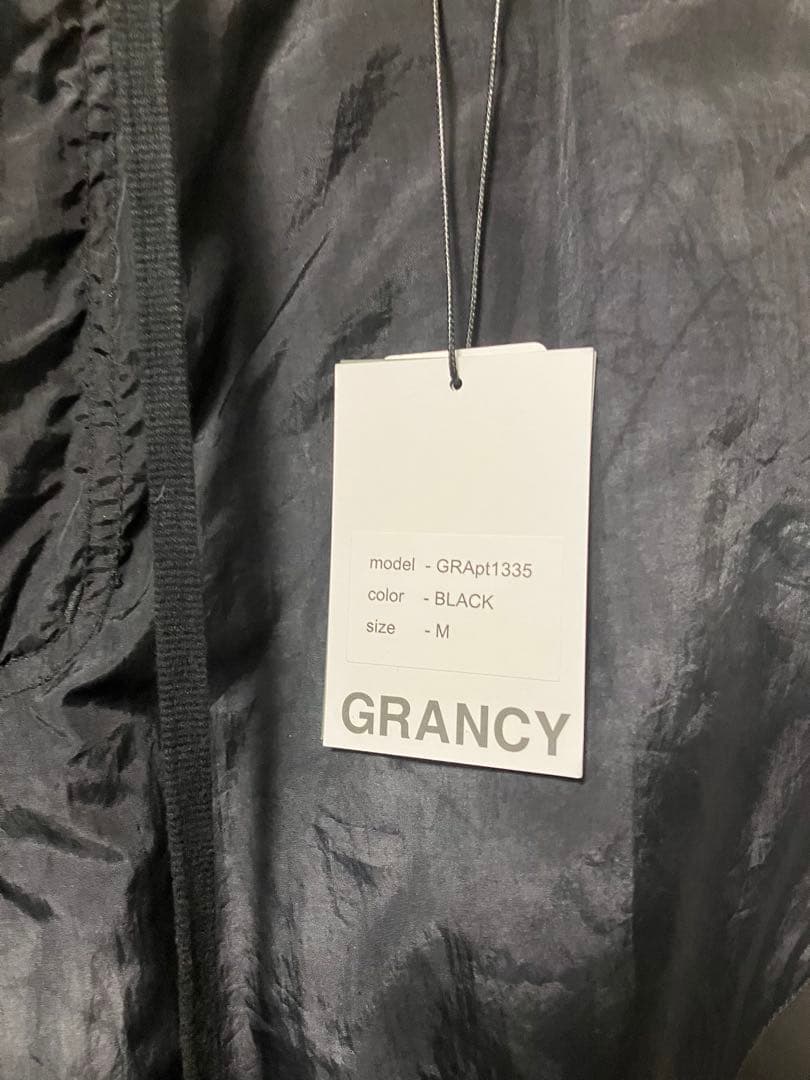【タグ付き・未使用品】 ボタンレイヤードデザインナイロンパンツ 【Grancy】