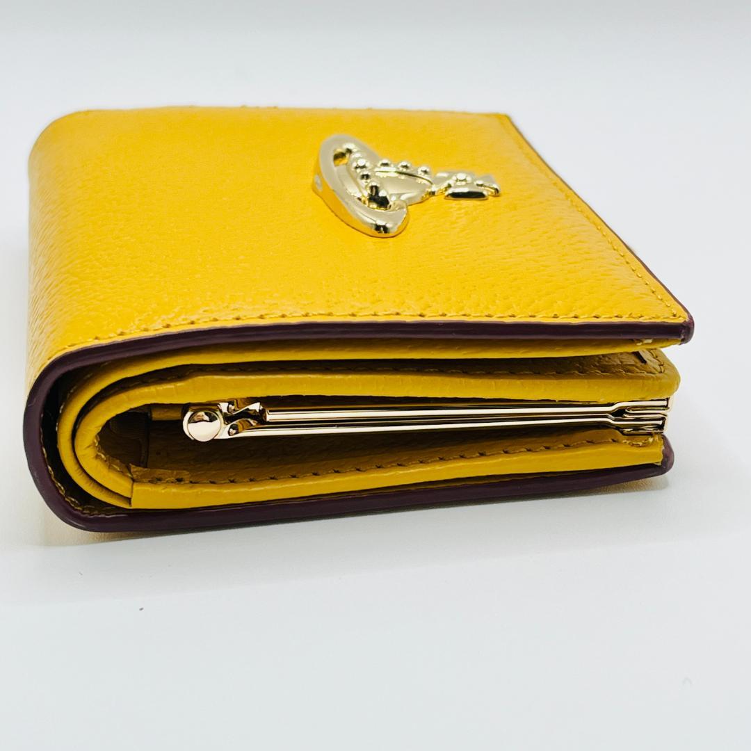 未使用 Vivienne Westwood 新品 折財布 黄色 がま口 シンプル