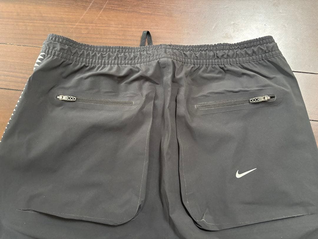 NIKE × UNDERCOVER GYAKUSOU GIZ柄 トラックパンツ